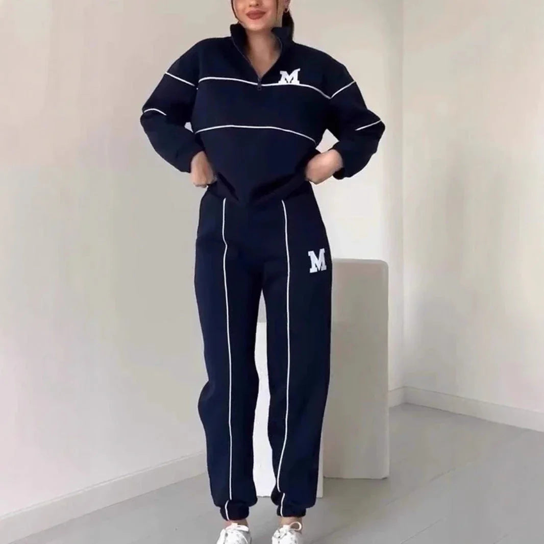 Comfortable and stylish two-piece loungewear set for women, featuring a hoodless pullover sweatshirt and relaxed-fit sweatpants with pockets.