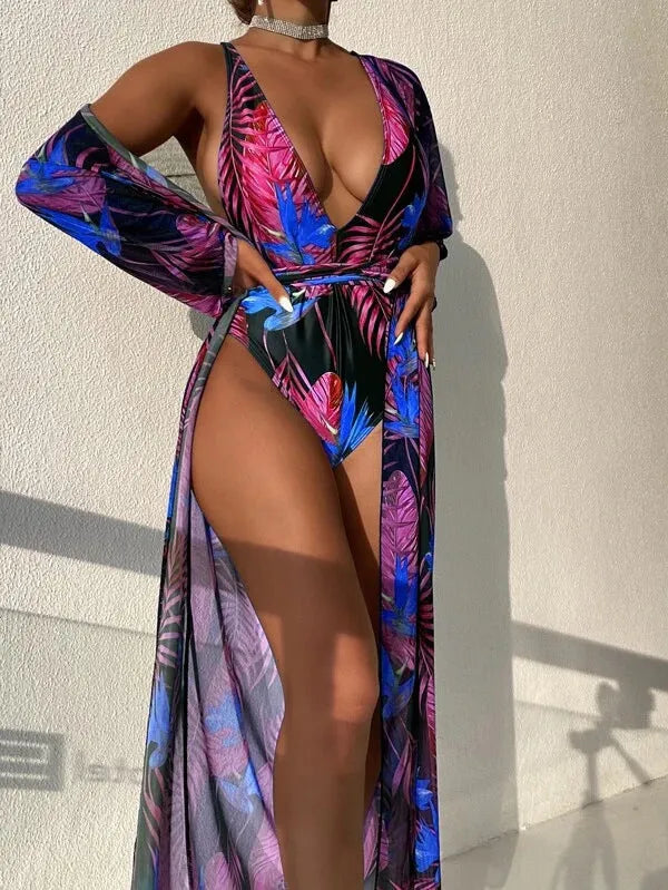 Women's three-piece polyester swimsuit set with matching coat in one of four available colour patterns.
