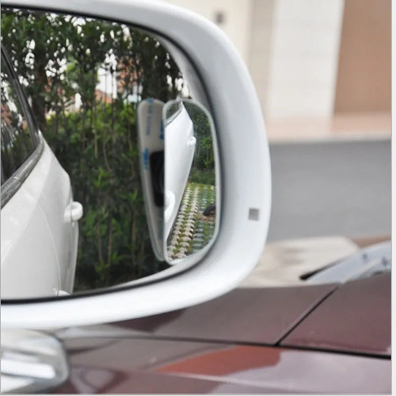 Universal adjustable car blind spot mirror with glass lens and adhesive mount shown in multiple colours.