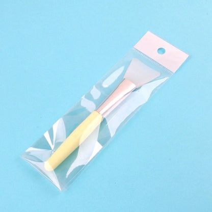 Silicone facial mask brush with 0.5cm bristles and 15cm handle in navy blue colour