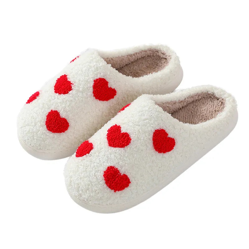Women's plush home slippers with cartoon love design, round toe, and non-slip PVC sole