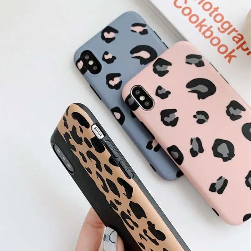 Leopard print iPhone phone case shown in black, blue, and pink colour options.