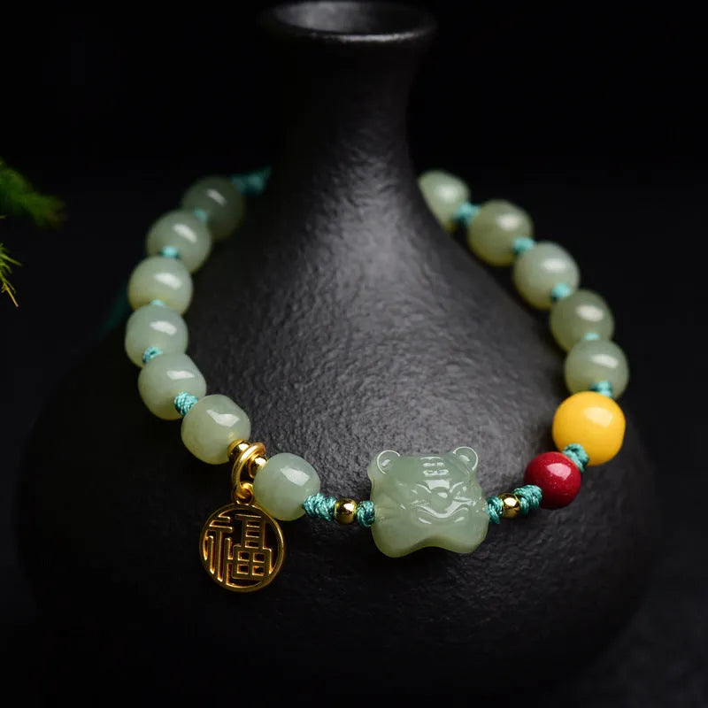 Natural Hetian Jade bracelet with cinnabar beads, beeswax elements and animal zodiac modelling
