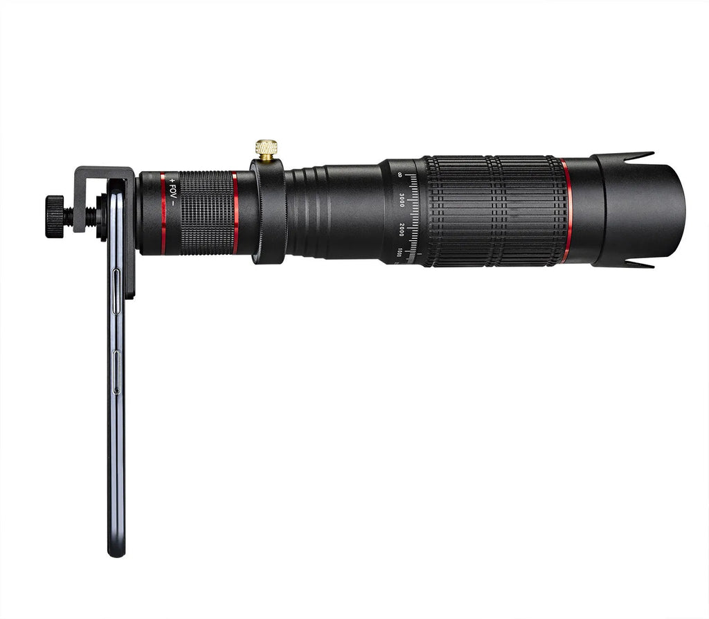 Black 36x telephoto mobile phone telescope with universal clip and carrying pouch on a table.