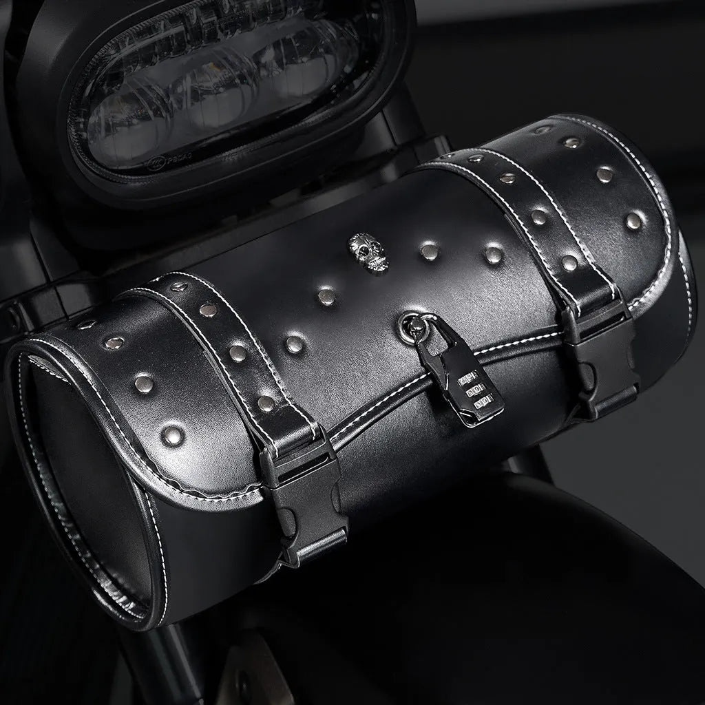 Black punk style retro motorcycle pannier saddle bag made from PU leather, mounted on a bike frame.