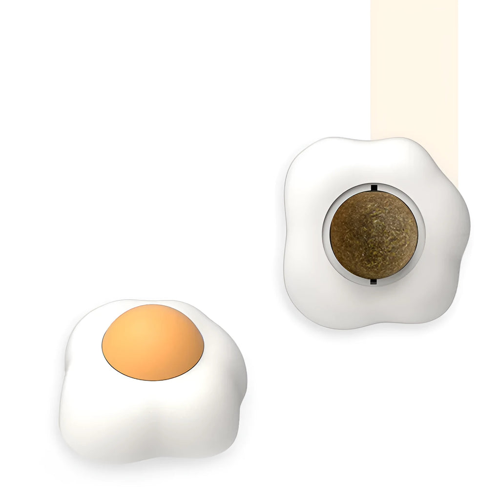 Interactive catnip ball toy for cats in fried egg and poached egg shapes with wall mount feature