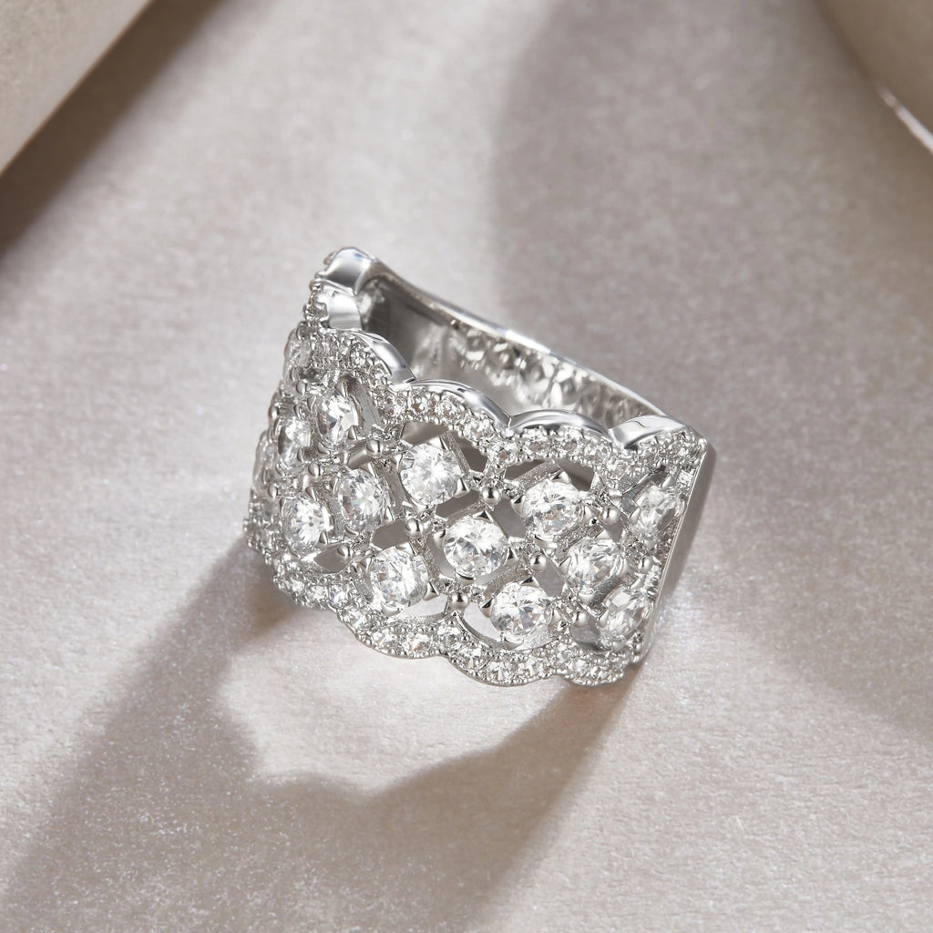 Lace Snowflake moissanite wedding ring set in S925 silver with platinum plating on a black background