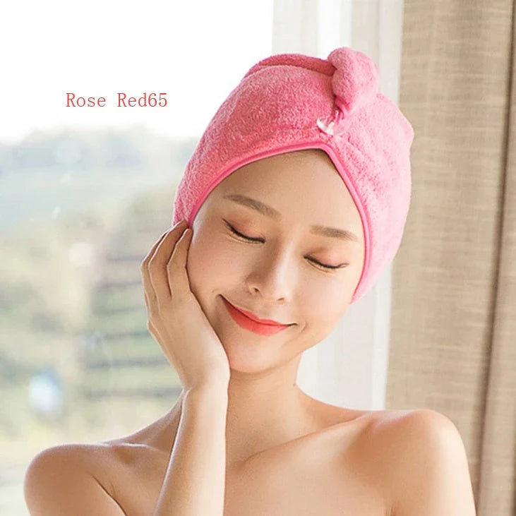 Absorbent microfiber hair turban in various vibrant colours, designed for fast and convenient drying