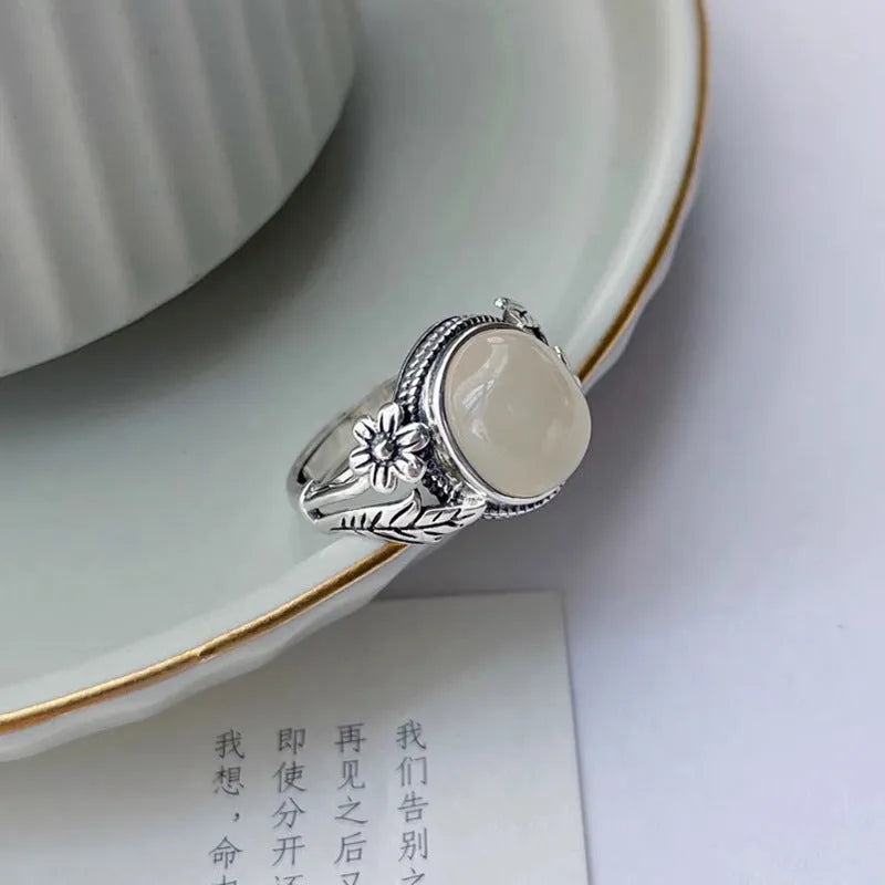 Copper adjustable vintage ring with imitation white chalcedony stone and antiqued finish