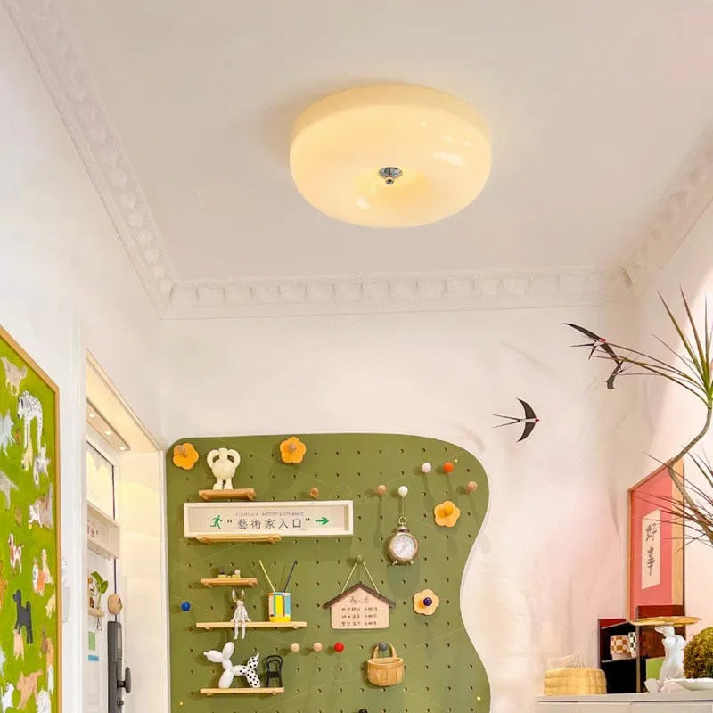 Cream-coloured American antique style ceiling lamp with a three-colour light function.