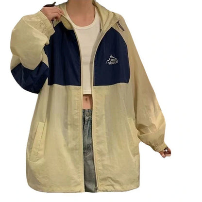 Women's summer sun protection top with raglan sleeves in apricot colour showing loose fit and splicing details