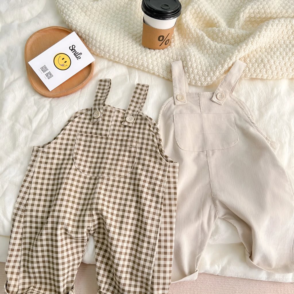 Infant plaid corduroy overalls in creamy-white with large pockets and double breasted closure
