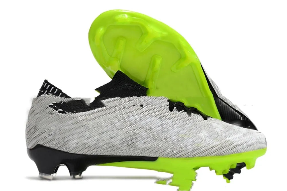 Men's waterproof football shoes with air cushion and FG studs for grass surfaces
