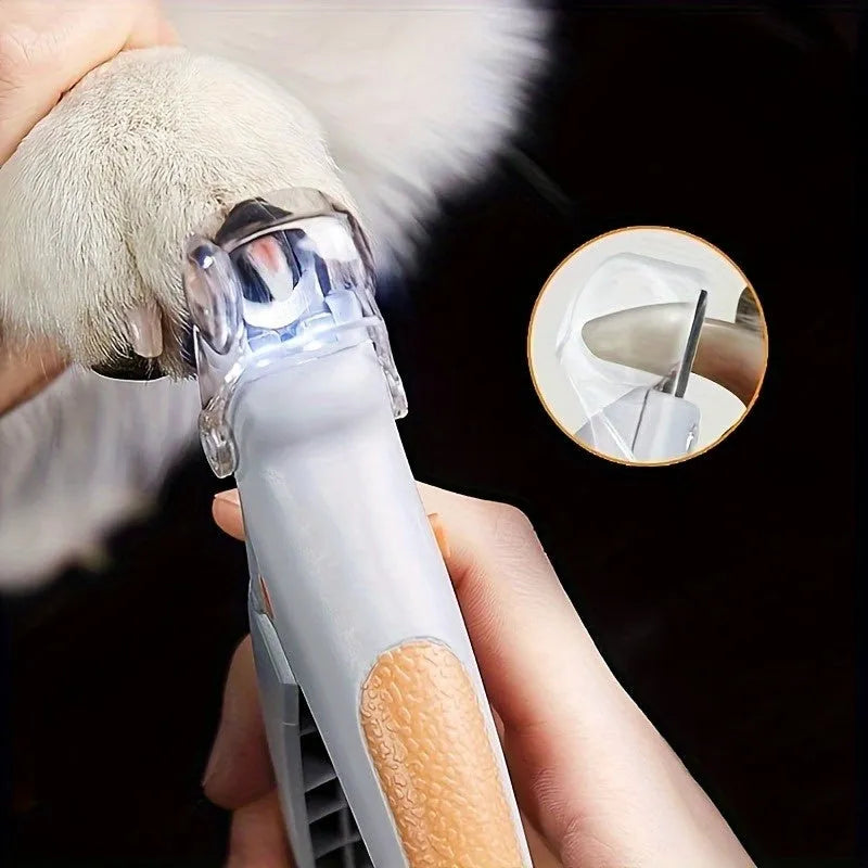 Yellow LED pet nail trimmer with magnifying glass and hardened steel blades for cats and dogs.
