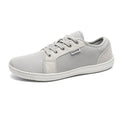 Men's low-top lace-up leisure sneaker with mesh upper, rubber sole, wide toe, flat heel, in black colour