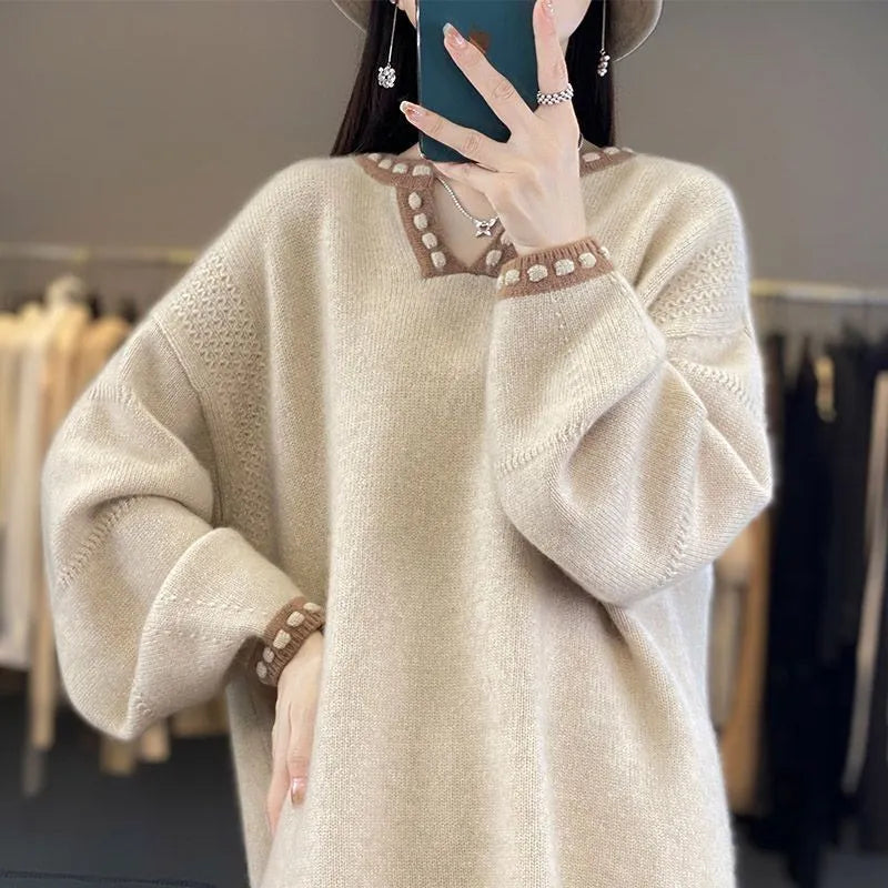 Women's camel V-neck long sleeve viscose pullover sweater on a hanger.