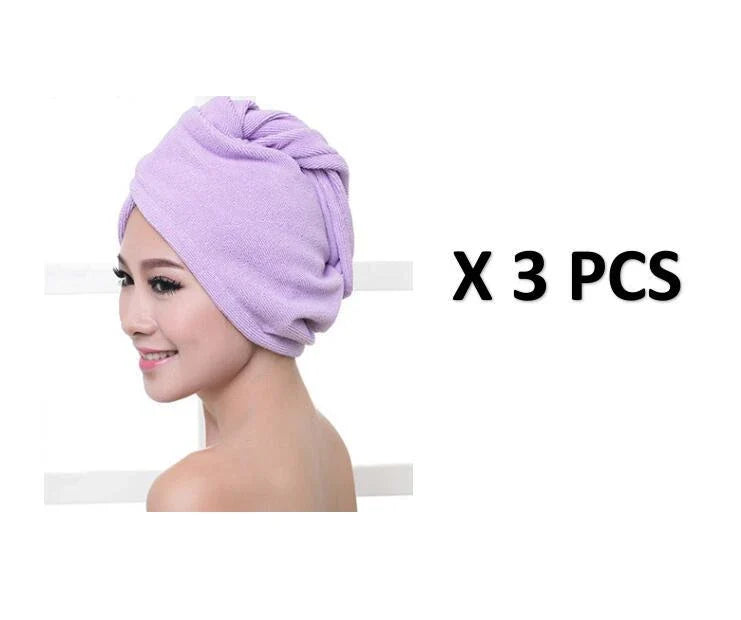 Absorbent microfiber hair turban in various vibrant colours, designed for fast and convenient drying