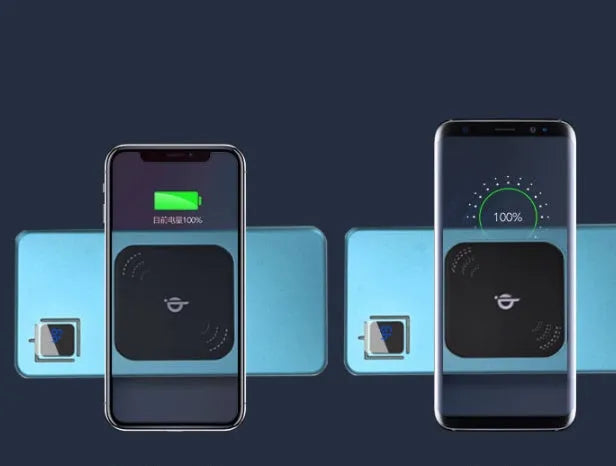 Black alloy power bank with LCD display showing battery percentage, next to a smartphone.