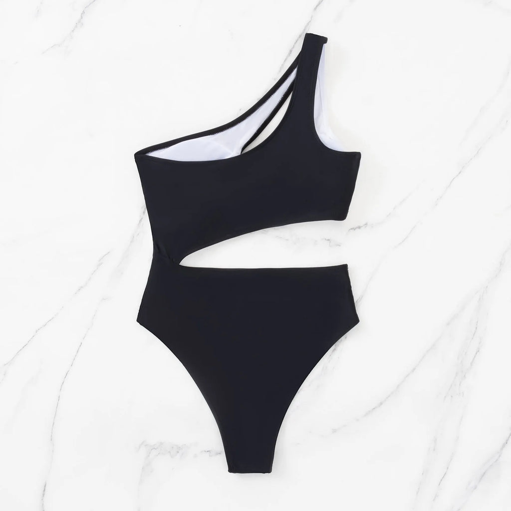 Black women's one-piece swimsuit with white contrast stitching and hollow back design