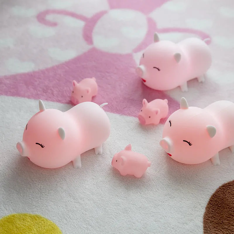 Dudu pig cartoon plastic night light with silicone shade emitting warm yellow and colourful LED glow