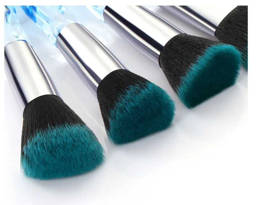 10 clear crystal foundation brushes with diamond shank handles and artificial fibre bristles.