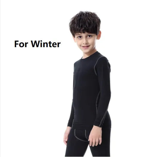 Kids sportswear set including black and green t-shirts, shorts, and trousers on a size chart.