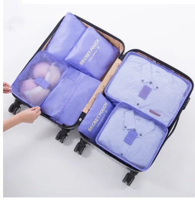 Durable waterproof packing cubes in various colors for organized, efficient travel