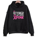 Men's black hoodie with white 'I'm A Survivor' retro print and a side seam pocket.