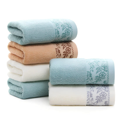 Creamy white wisteria flower jacquard cotton towel, 32 ply absorbent, 34x73cm dimensions