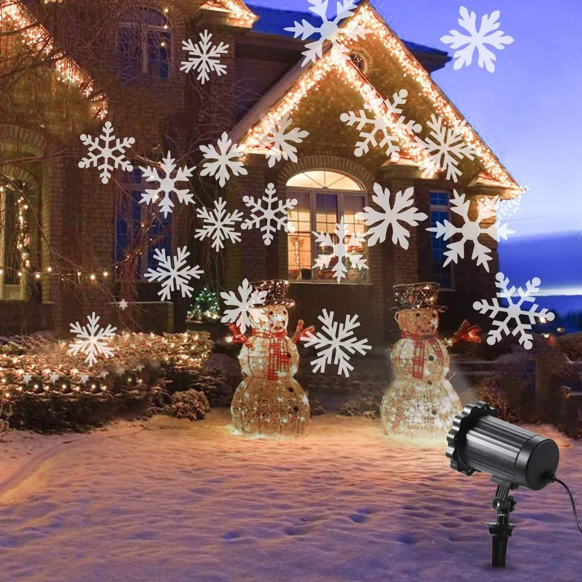 LED Christmas snowflake laser projector with white snowfall pattern on a garden lawn at night