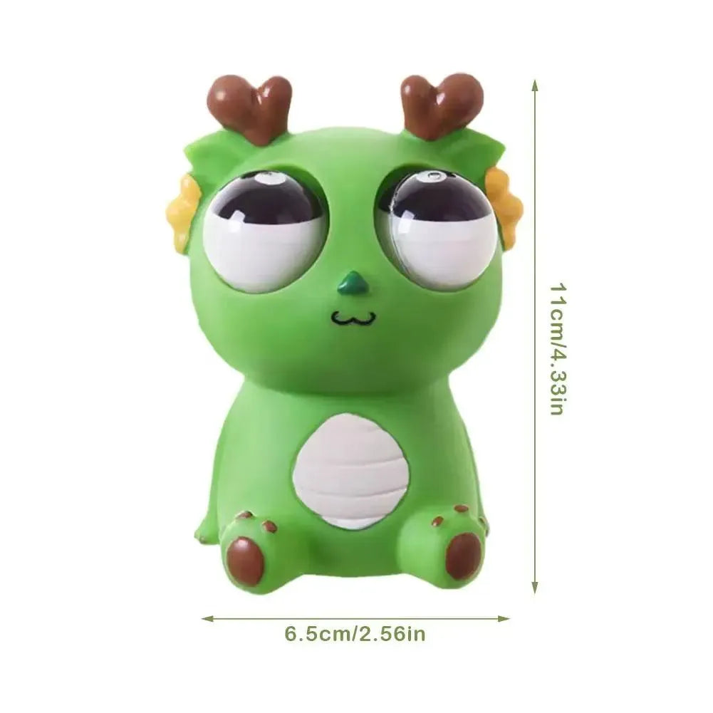 Cute staring dragon eyeball burst squeeze toy in orange colour on white background