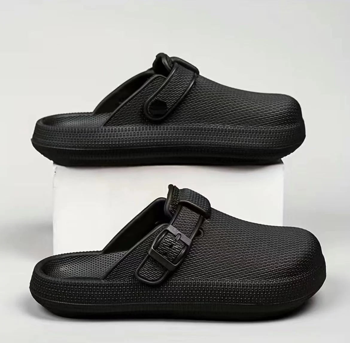 Lightweight EVA indoor home slippers in black, gray, and white