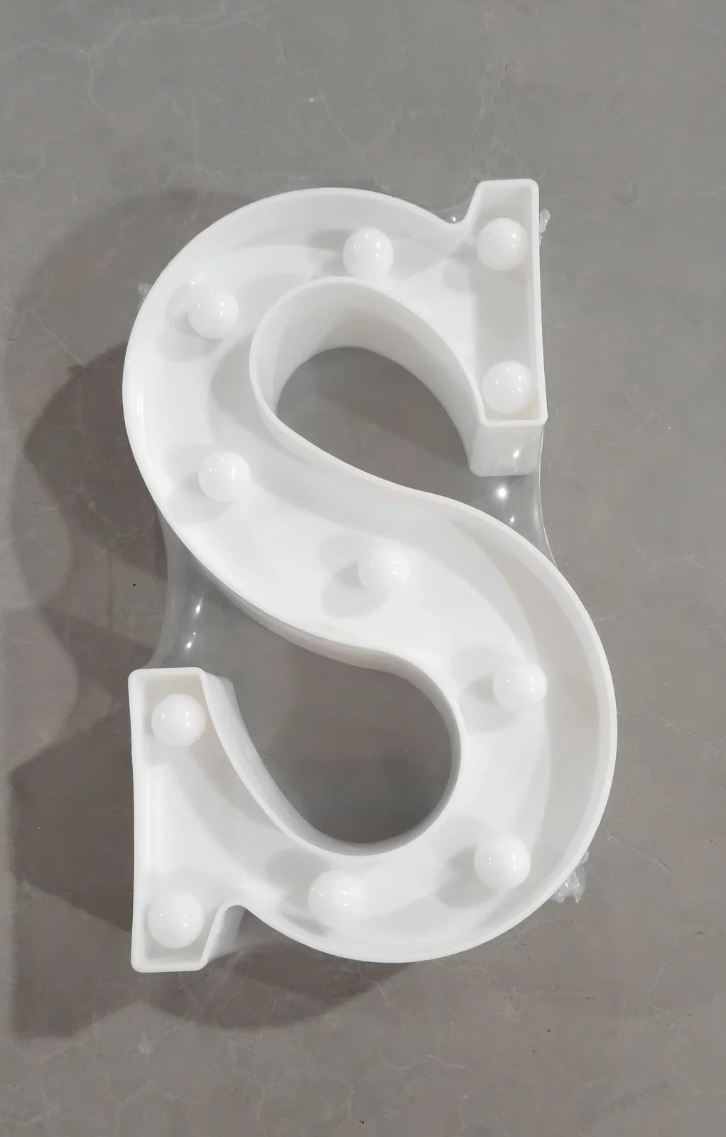 White plastic LED alphabet marquee sign with warm white illumination, 22cm height with battery operation