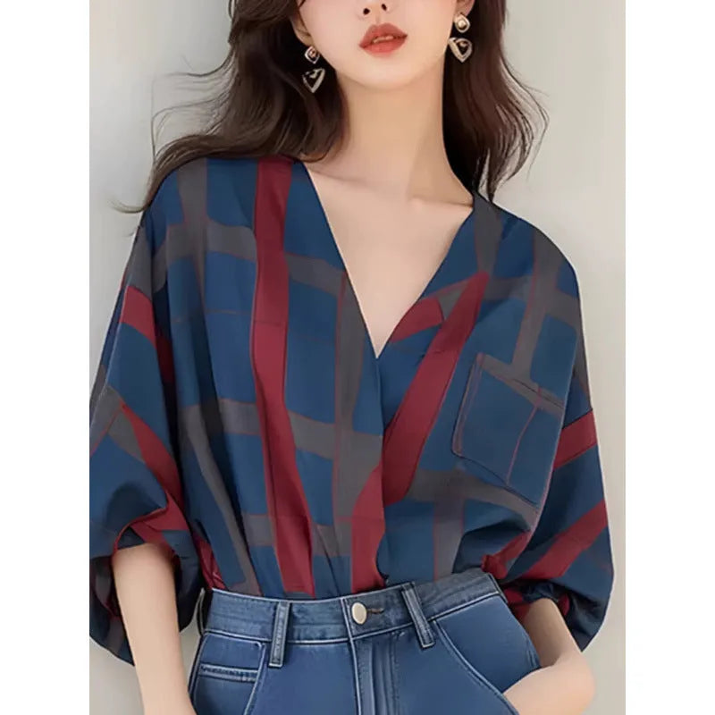 Women's loose-fit pullover top with painted pattern, short length, and drop-shoulder sleeves in polyester