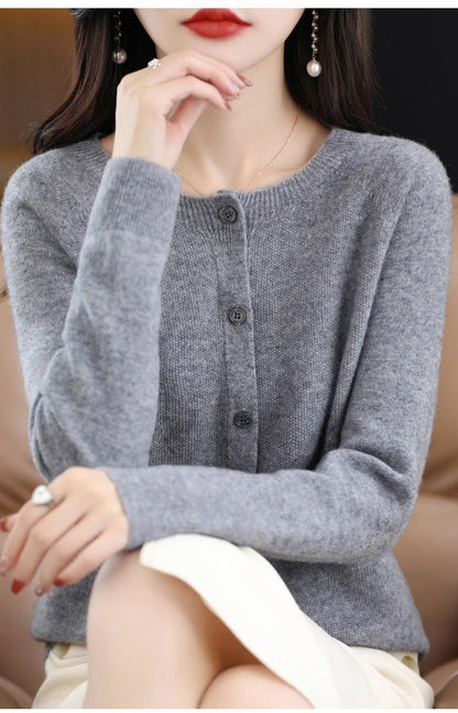 Women's merino wool cardigan in various colours, featuring an O-neck and long sleeves