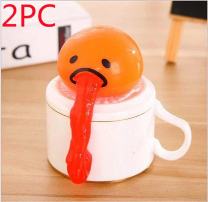 Gudetama Vomiting Egg Toy in green, orange, pink, and yellow
