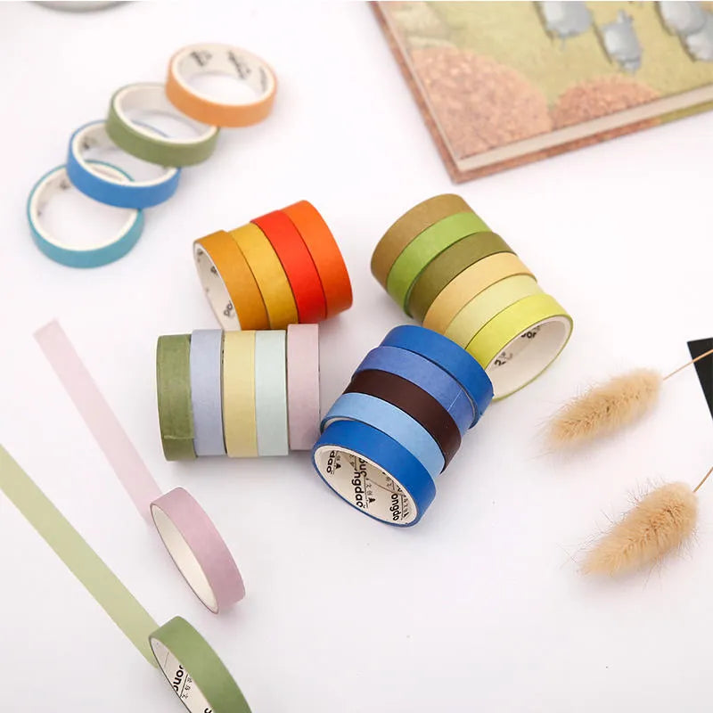 Six rolls of solid colour washi tape in a pack showing solar term designs like Start of Spring and Autumn Equinox