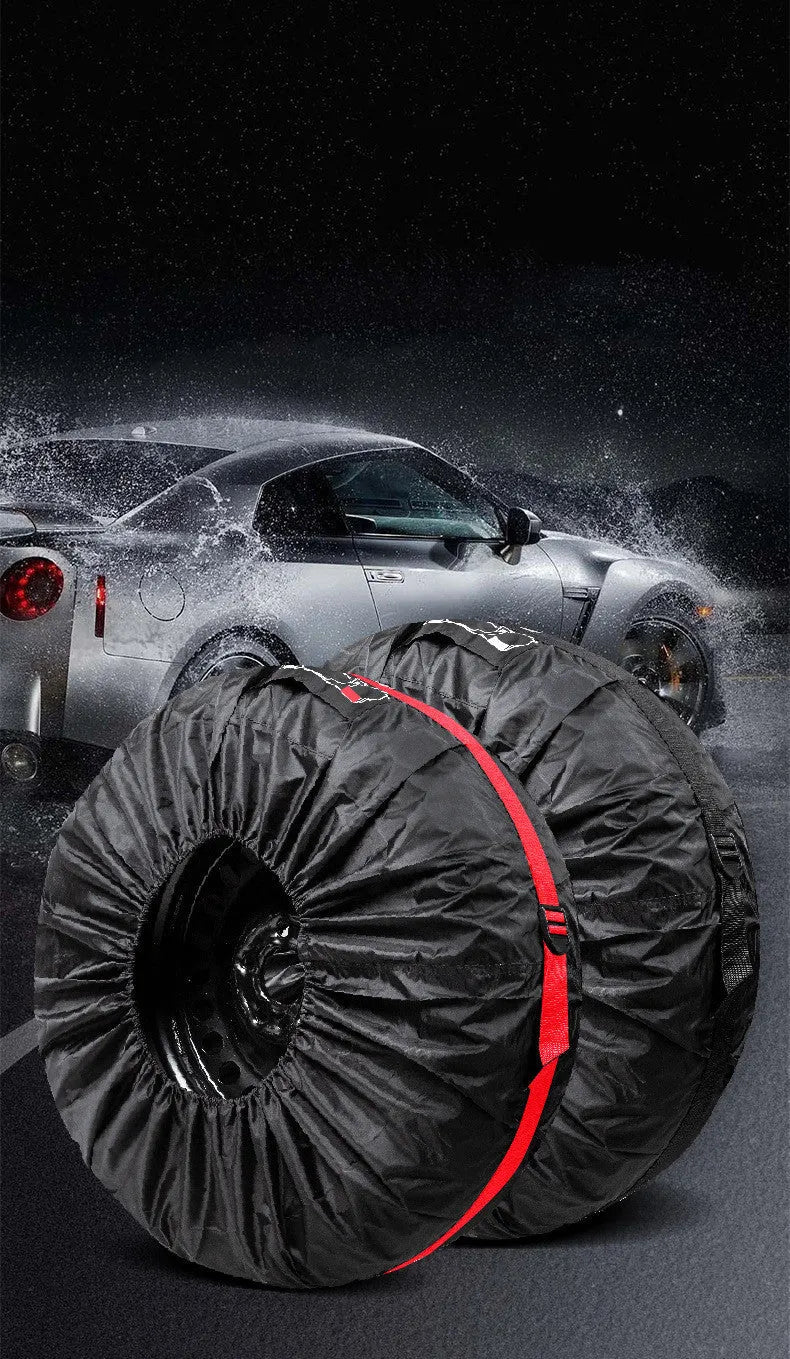 Four black Oxford cloth tyre protective covers laid flat, showing their circular shape and belt-style detailing.