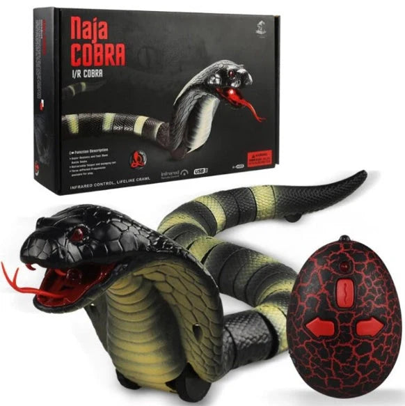 Remote control rattlesnake toy with realistic slithering motion and egg-shaped controller