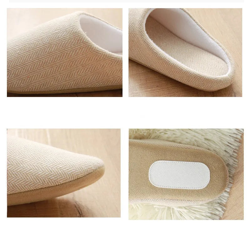 Men's black cotton indoor slippers with soft anti-skid sole on a wooden floor
