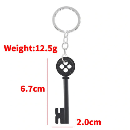 Unisex black key pendant necklace with star details on alloy chain, electroplated for durability, 45-50cm length