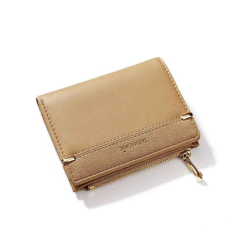 Ladies fold wallet in PU leather with zipper closure, showing internal card slots and compartments.