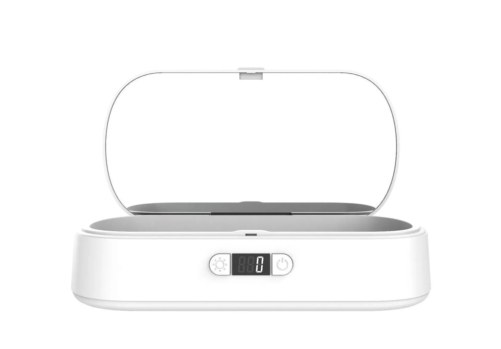 White UV sterilisation box with wireless charging for mobile phones and small personal items.