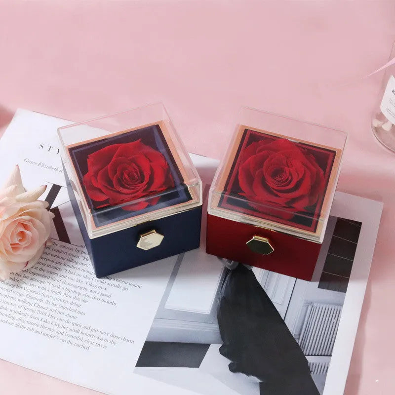 Acrylic rotating rose jewellery box in Chinese red with compartments for rings and earrings