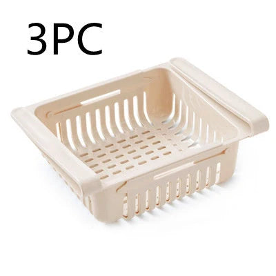 Stretchable refrigerator storage basket in white, blue, pink, and apricot colours