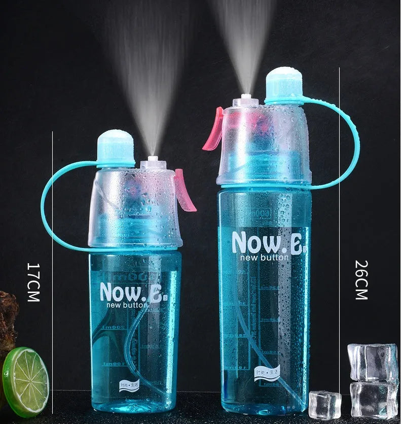 Green portable outdoor mist spray cup with handle, leakproof pad, and visible water level scale.