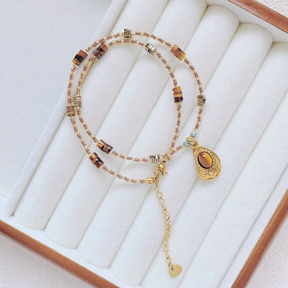 Geometric Maillard colour necklace for women with titanium steel chain and unique pendant options