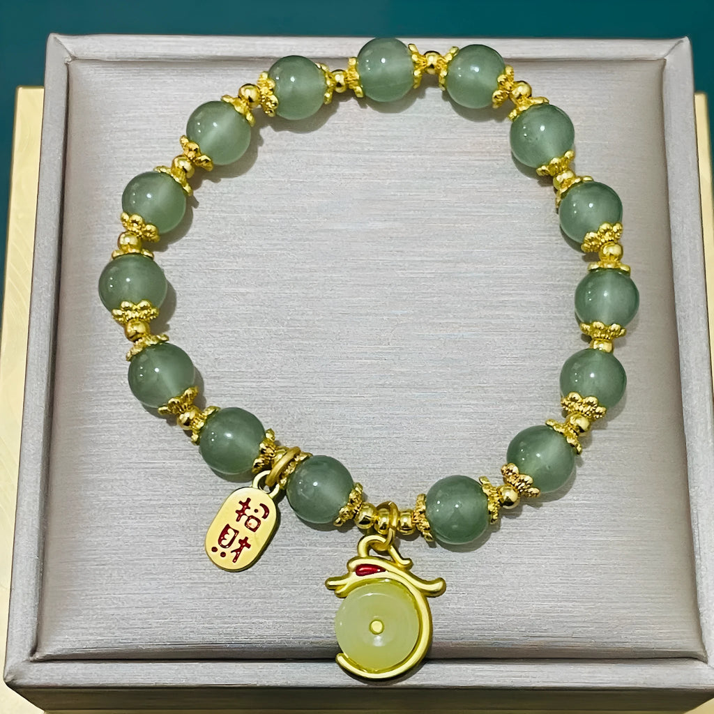 National style bracelet with rabbit charm, coloured glaze and glass beads, peace buckle clasp