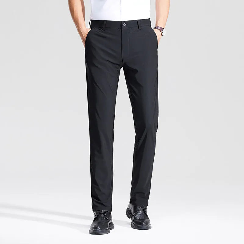 Pair of men's summer ice silk straight-leg suit trousers in solid colour on white background