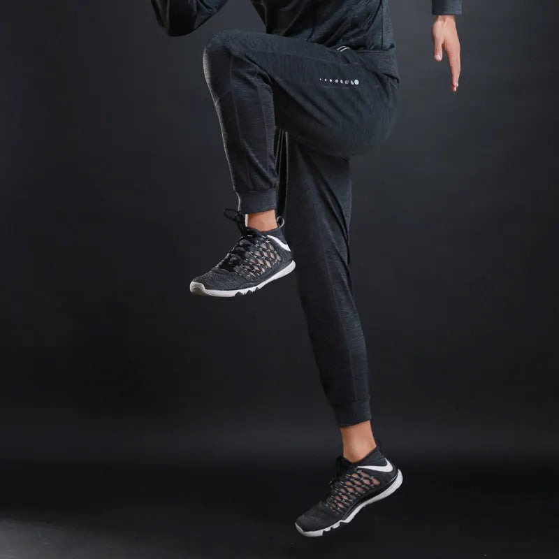Grey and Royal Blue polyester fitness trousers with elastic waist for training and casual wear